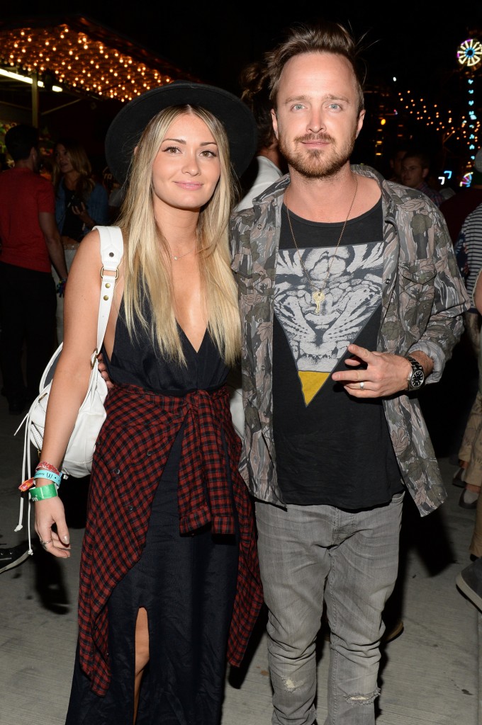 Actor Aaron Paul (R) and Lauren Parsekian attend the Neon Carnival with PacSun, "Dope the Movie and Tequila Don Julio. Photo Credit: Michael Kovac/Getty Images for NEON CARNIVAL