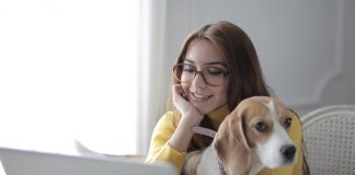 Woman Holding a Dog