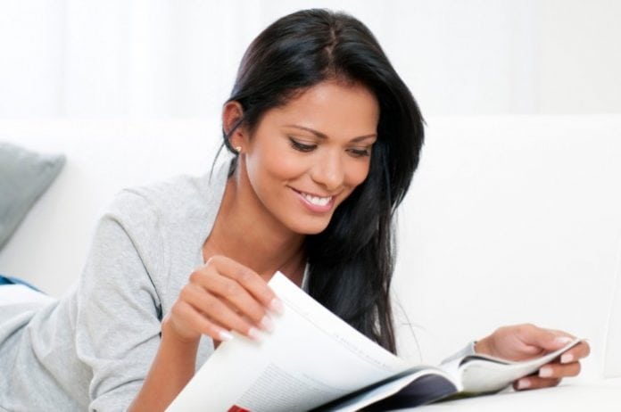 Person reading booklet