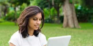 Woman Using Laptop Outdoors