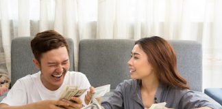 Young couple organizes their finances.