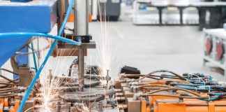 Industrial welding machines in the workshop, in the process of work and movement