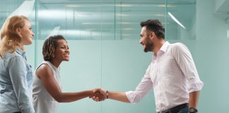 Businesspeople shaking hands before meeting