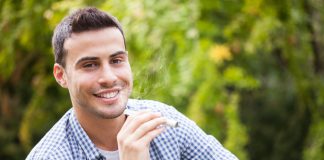 Man holding an electronic cigarette