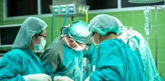 Doctors operating in hospital