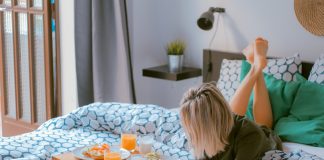 Woman enjoying her bed and breakfast stay