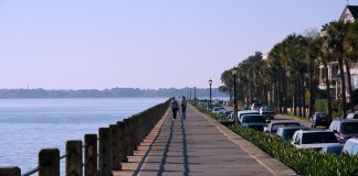 Women walking on a pier