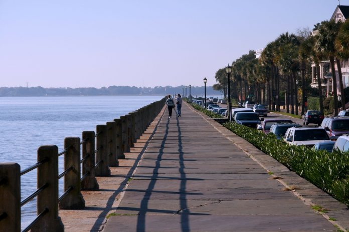 Women walking on a pier