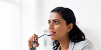 businesswoman with glasses at office