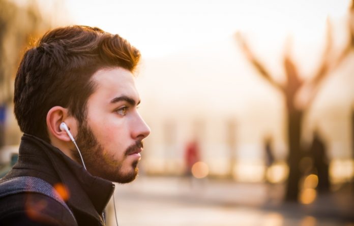 Man listening to music outside