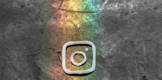 Instagram logo against rainbow background