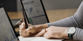 Woman analyzing data on computer