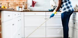 Woman mopping floor