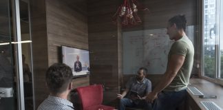 Startup businesspeople group attending videoconference call