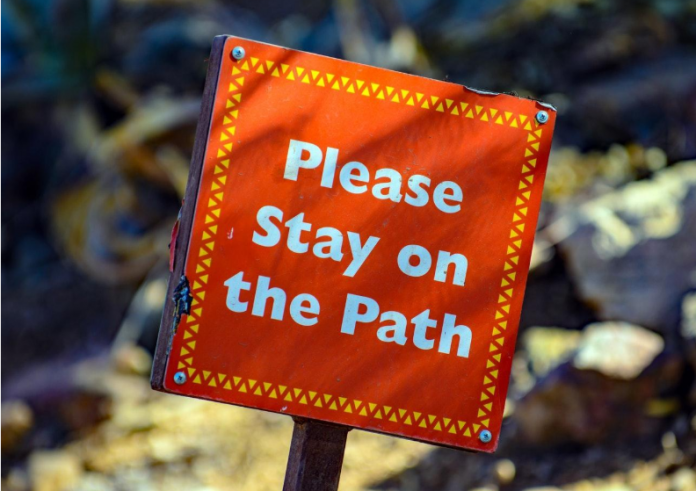 Stay on the path sign
