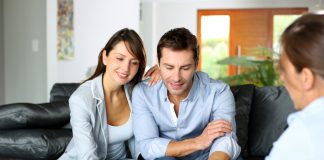 Couple meeting consultant for financial contract