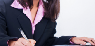 Woman calculating her taxes