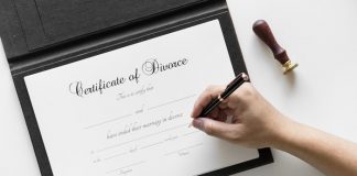 Person signing divorce certificate