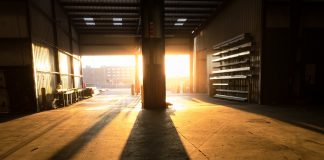 Warehouse lit with light from setting sun