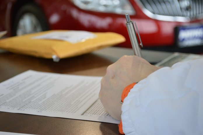 Person signing financial document