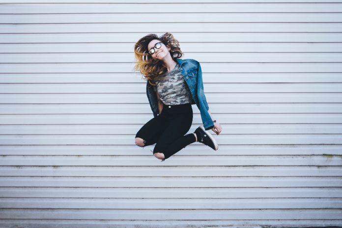 Woman jumping in happiness