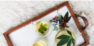 CBD oil artfully arranged on tray