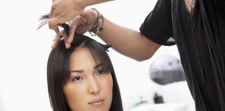 Woman getting haircut