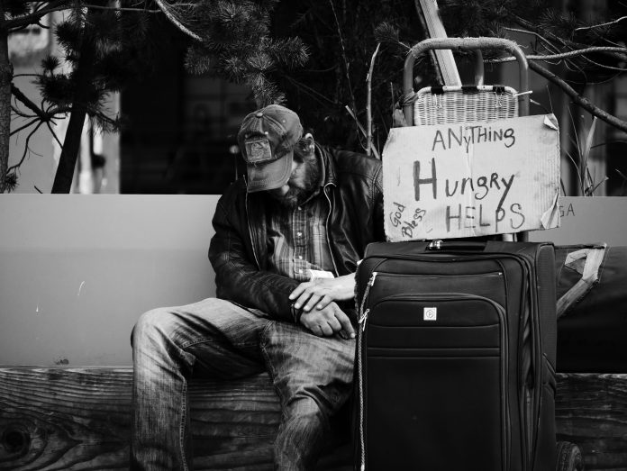 Sad homeless person