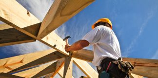 Carpenter working on roof