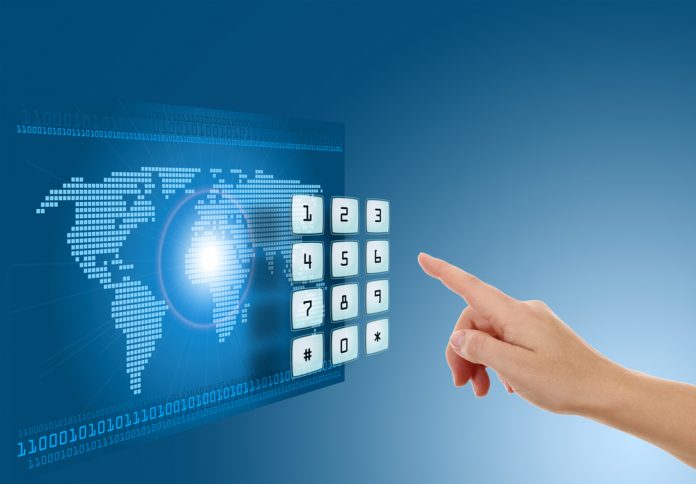 Hand pushing touch screen button with blue background with map
