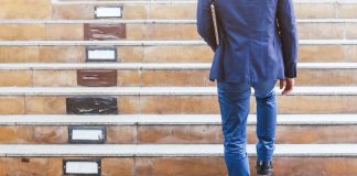 Businessman walking up the stairs