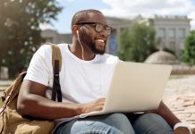Man sitting with laptop