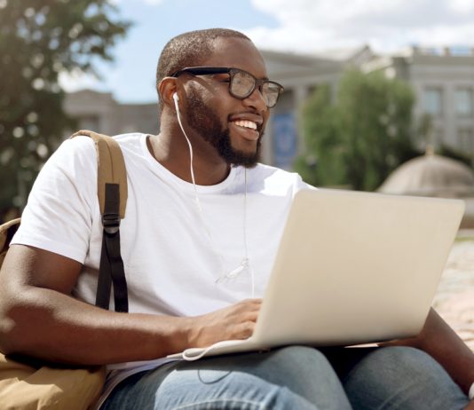 Man sitting with laptop