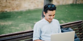 Entrepreneur Working on Laptop Outside