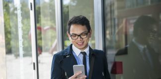 Businessman looking at phone