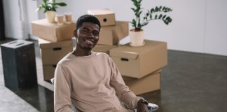 Man in office with boxes