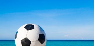 Soccer ball on sand