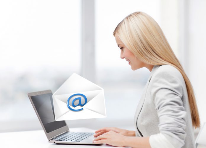 Woman sending an email