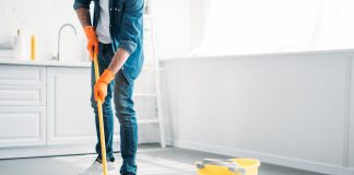 Person cleaning apartment