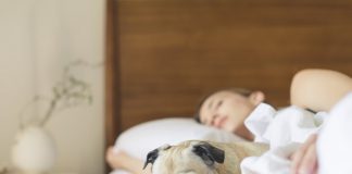 Dog and Woman Sleeping