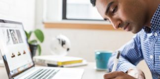 Man Writing a Book