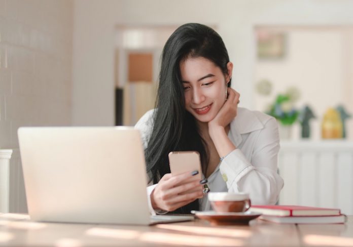 Woman Looking at Phone