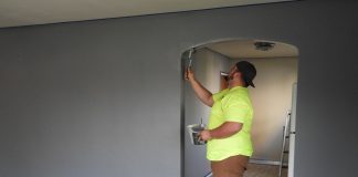 Person Painting Walls