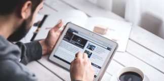 Man Working on Tablet