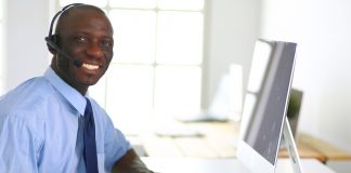 Businessman with headset working