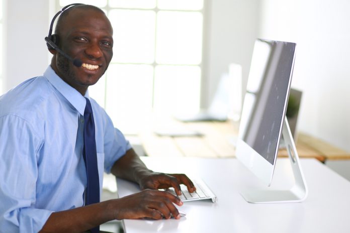 Businessman with headset working