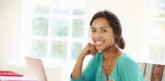 Businesswoman Working in Office at Home