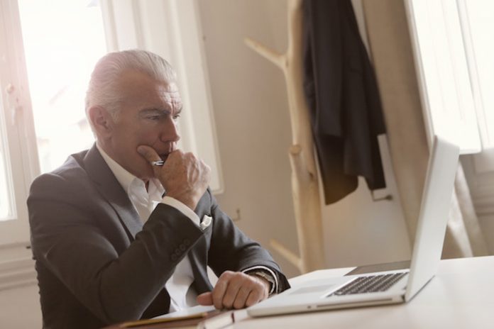 Older man at computer