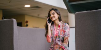 Lady smiling and talking on phone