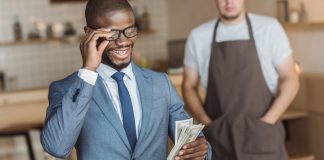 Businessman holding cash